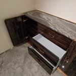 Marble-Top Sideboard Cabinet with Dark Striped Wood Veneer, Rounded Side Doors, and Central Drawer Storage